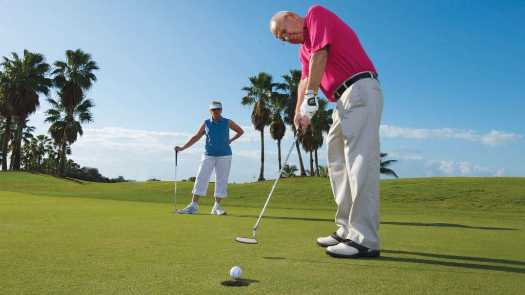 Old couples playing golf at Shell Point Retirement Living in Fort Myers, FL